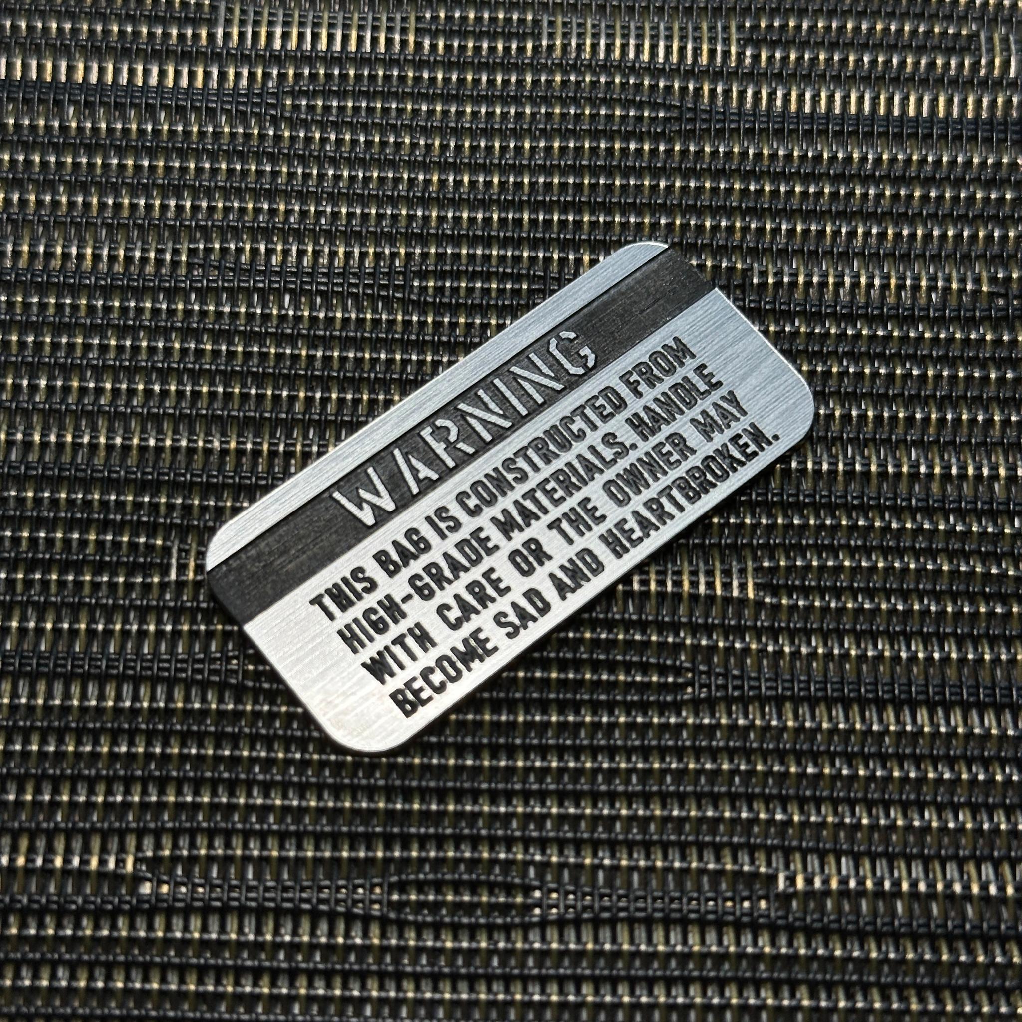 ◆TUMIバッグ-S◆ 49x23mm カスタムプレート WARNING シルバーｘブラック レザーパッチ交換用 トゥミ